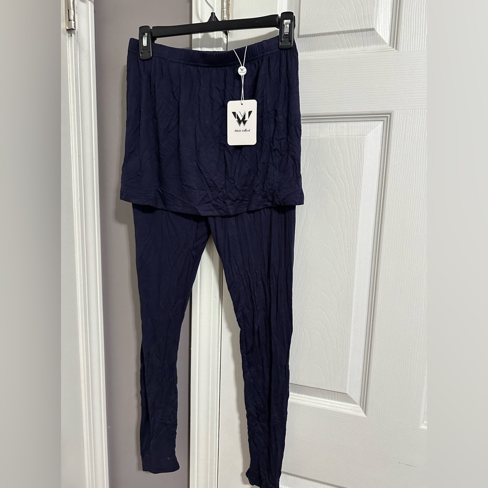 Skirted, navy blue leggings, brand new with tags
